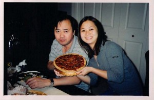 Wendy with her father, Tom Lieu, during a Thanksgiving holiday celebrating with a pecan pie. Photo courtesy of Wendy Lieu.