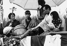 Actor Toshiro Mifune rehearses scene with Kayo Hatta (lower left)