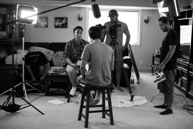 Filmmaker Tadashi Nakamura working on the documentary, Jake Shimabukuro: Life of Four Strings. Photo by Aaron Yoshino.