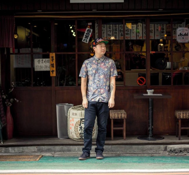 Chef and Korean adoptee Eric Ehler hangs out in front of a Sushi-Ya in Taipei. Photo credit: Pete Lee.