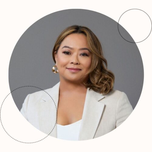 Filipina woman in white blazer